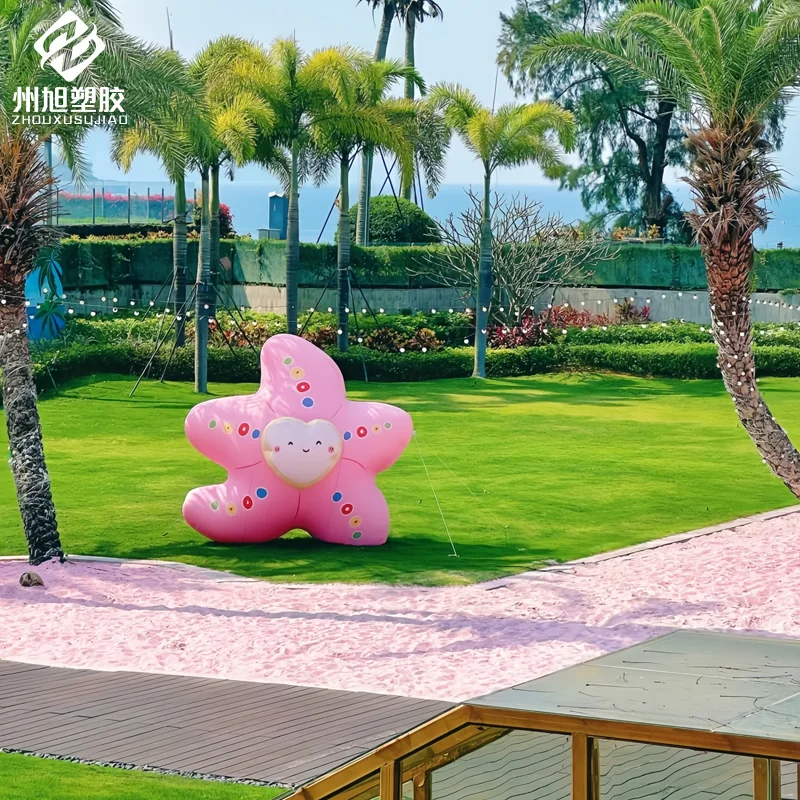 Cartoon opblaasbaar roze ster luchtmodel - decoratieve rekwisieten voor winkelcentra, buiten, aan zee en strandactiviteiten