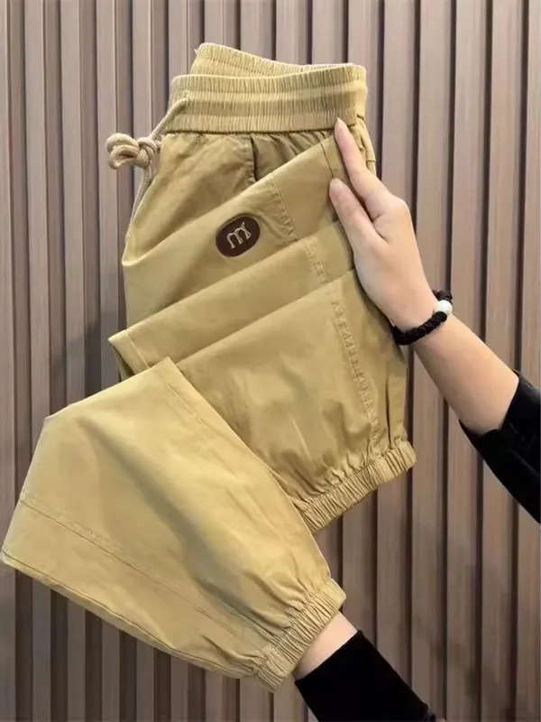 سراويل رجالية صيفية من الحرير الجليدي سريعة الجفاف غير رسمية فضفاضة تناسب الخصر المرن نمط هارلان تسعة نقاط كاكي اللون العلامة...