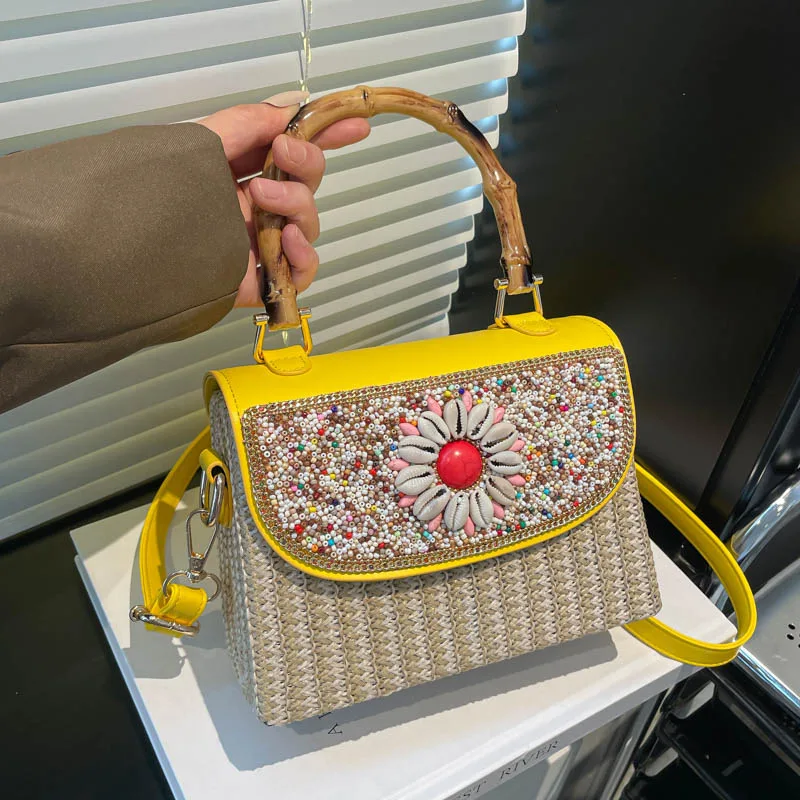 Bolso de mano tejido para mujer, verano 2026, con asa de bambú, decoración de conchas y flores, bolso tote de moda para playa y viajes, bandolera de hombro