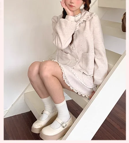 Otoño Invierno nuevas mujeres agradable arco blanco roto lindo cuello Peter Pan Chaqueta corta moda reductor de edad versátil Top de manga larga