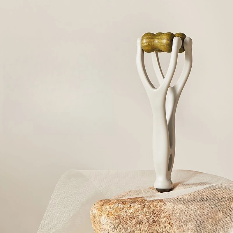 

Green sandalwood multi-functional finger massager, hand joint massage stick