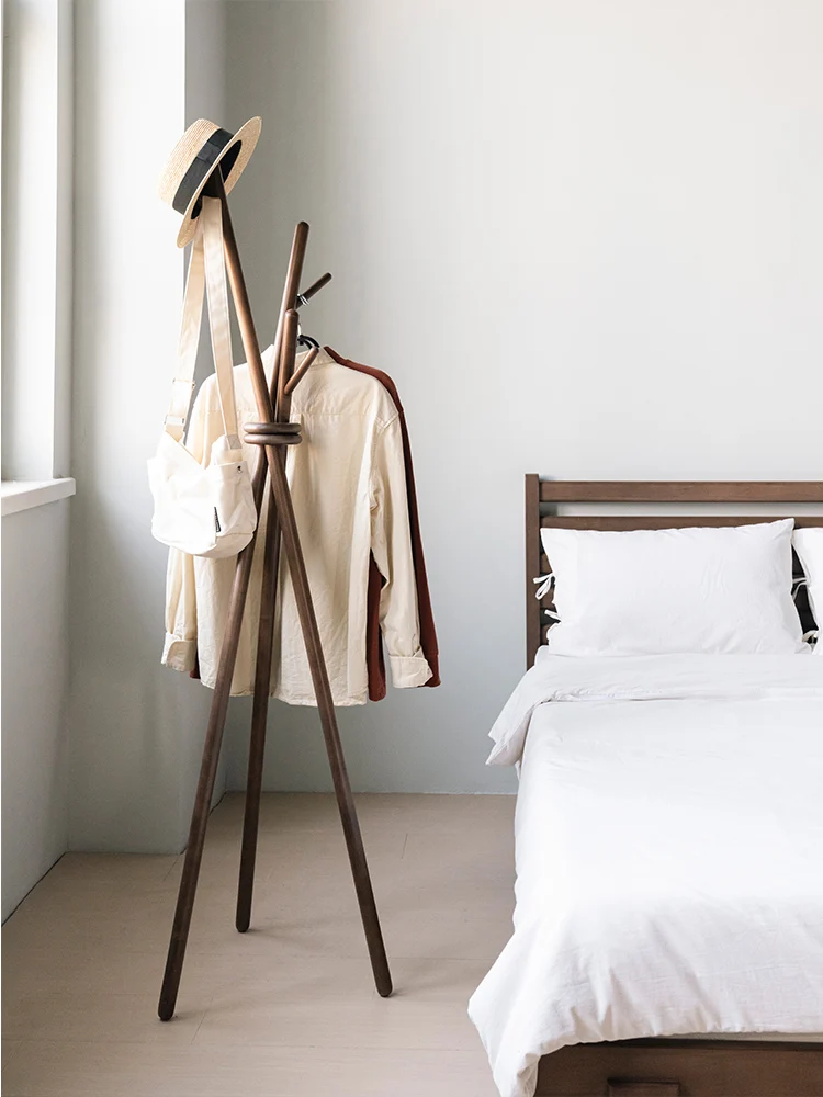 creative floor to ceiling coat hanger, hotel office, simple bedroom, light luxury, interior, high-end sense coat hanger rod