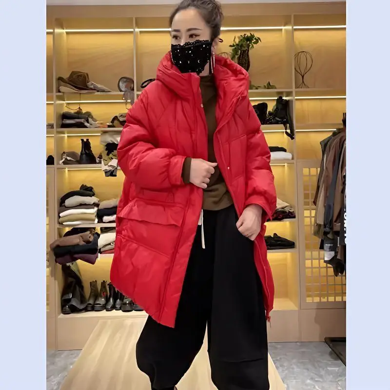 Pato branco para baixo jaqueta feminina anti-temporada especial nova moda solta médio e longo engrossado quente com capuz design de cor sólida