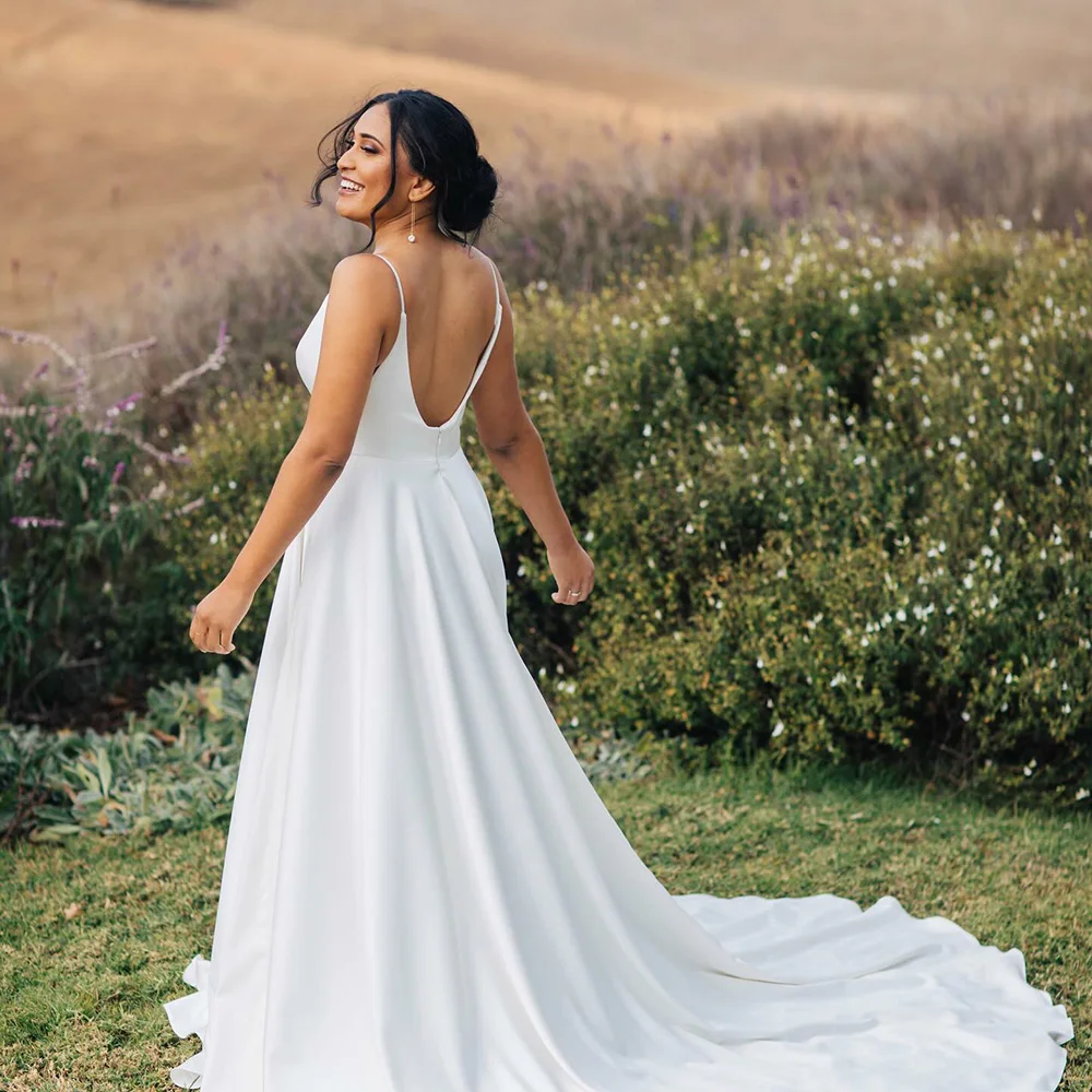 2025 Satin Wedding Dresses Deep V Neck A Line Backless Sexy Spaghetti Strap Bridal Gown Outdoor Women Bride Dress Customized