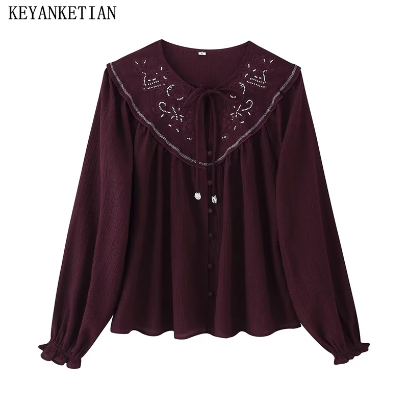 

KEYANKETIAN Autumn New Women's Flared Sleeve Round Neck Bow Tie Single Breasted Bead Embroidery Shirt Women Casual Top