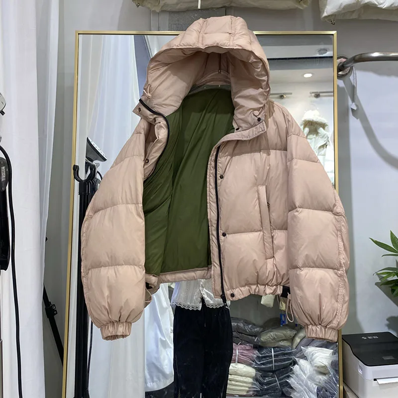 อารมณ์สั้นผู้หญิงCoat2025 ฤดูหนาวใหม่หนาลงเสื้อแจ็คเก็ตผู้หญิงHoodedหลวมเป็ดสีขาวลงผู้หญิงลงแจ็คเก็ตH555