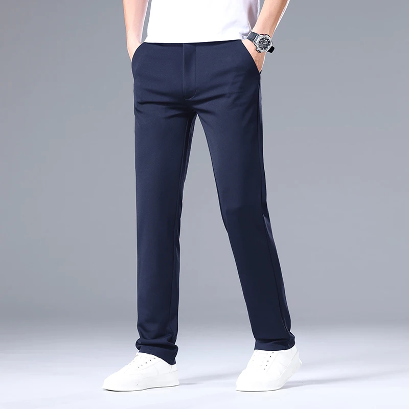 Pantaloni da tuta elastici senza stiratura per uomo primavera autunno pantaloni Casual sottili in tinta unita pantaloni a gamba dritta pantaloni Slim Fit da lavoro