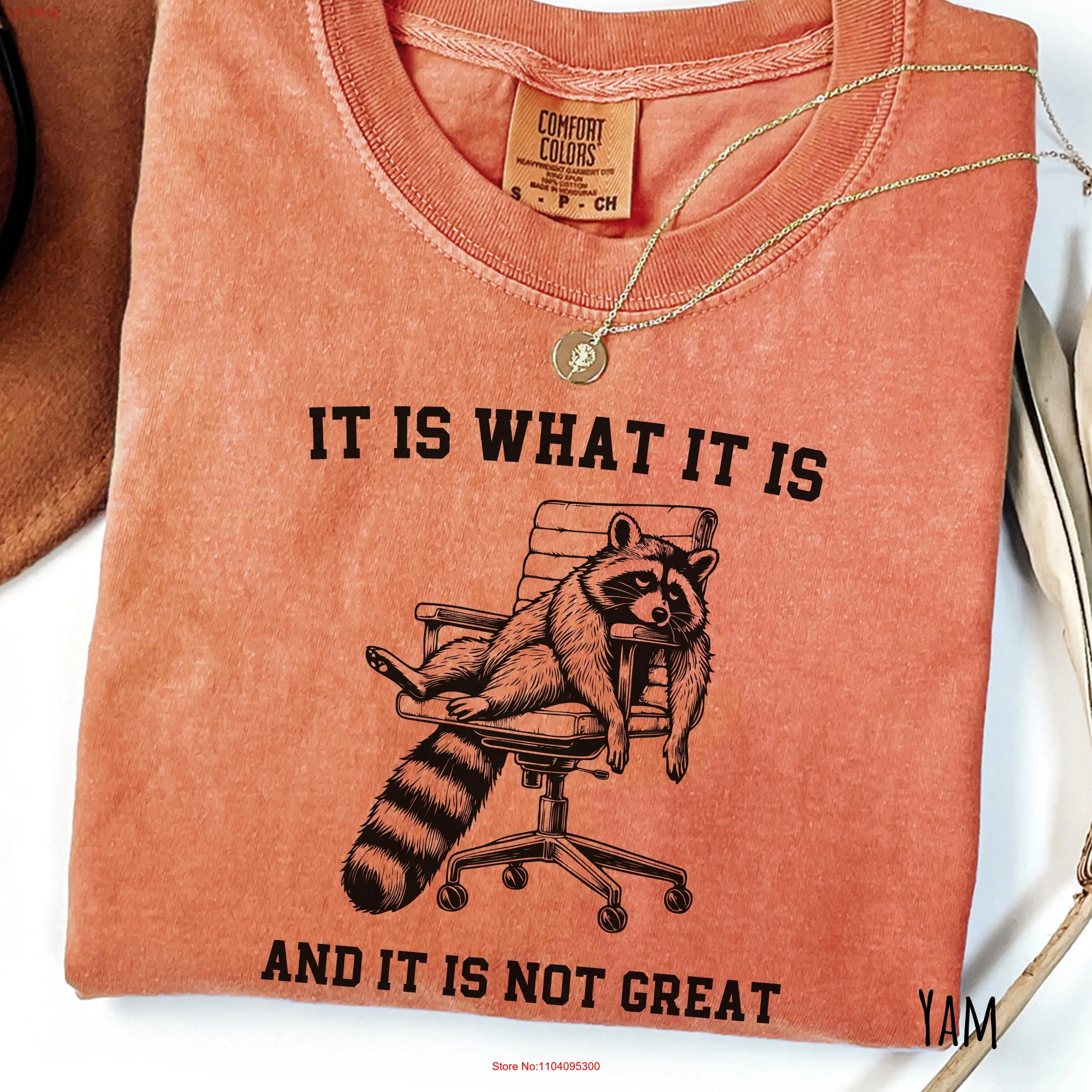 

Comfort Colors Funny Raccoon T shirt It Is What And Not Great Sarcastic Quote Meme Mental Health long or short sleeves