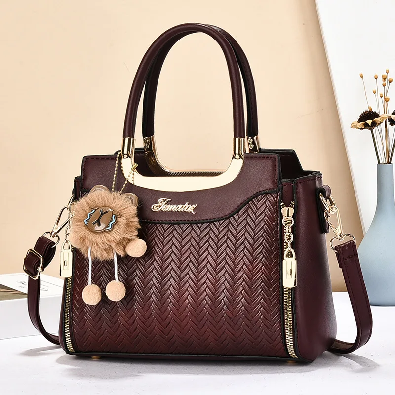 

2025 The new stylish ladies hand bag the retro style of large capacity multi-layer shoulder crossbody bag commuter Handbag
