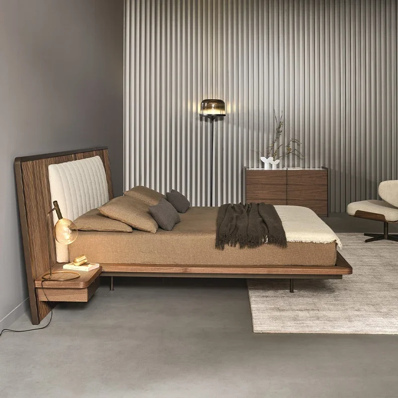 High end luxury master bedroom bed in black walnut wood on the large flat floor of the villa