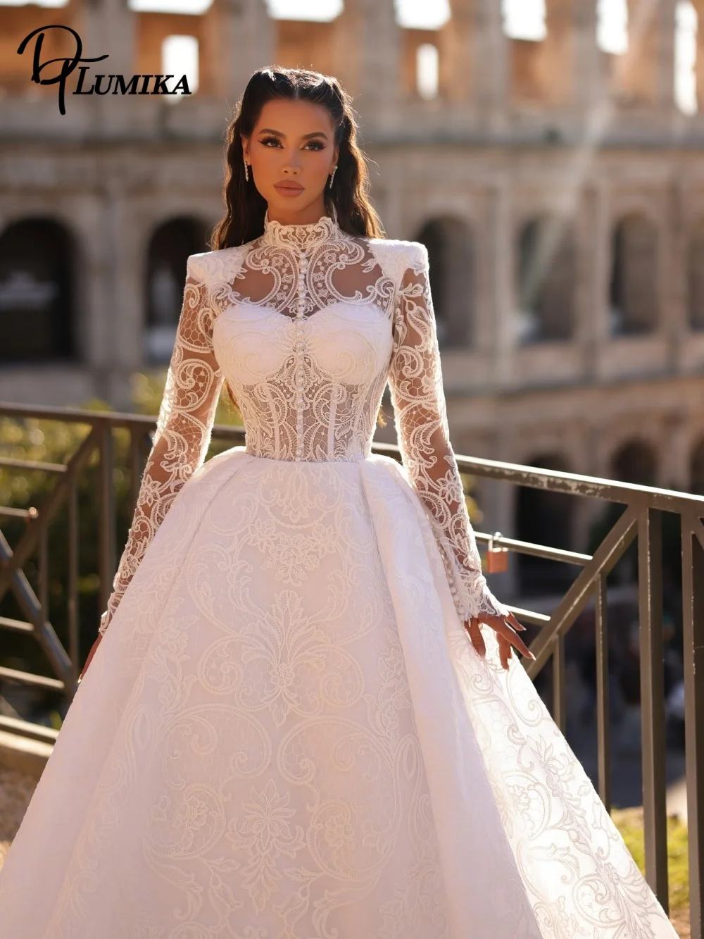 

Glamorous Luxury Bridal Gown High Neck Long Lace Sleeves Open Back Intricate Floral Lace Voluminous Gown for Wedding Ceremony