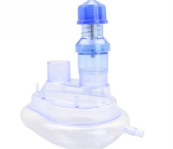 Disposable twin port mask with peep valve