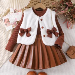 Autumn and Winter Girls' New Solid Color Long Sleeved Top Pleated Short Skirt Furry Vest Bow Fashion Three Piece Set