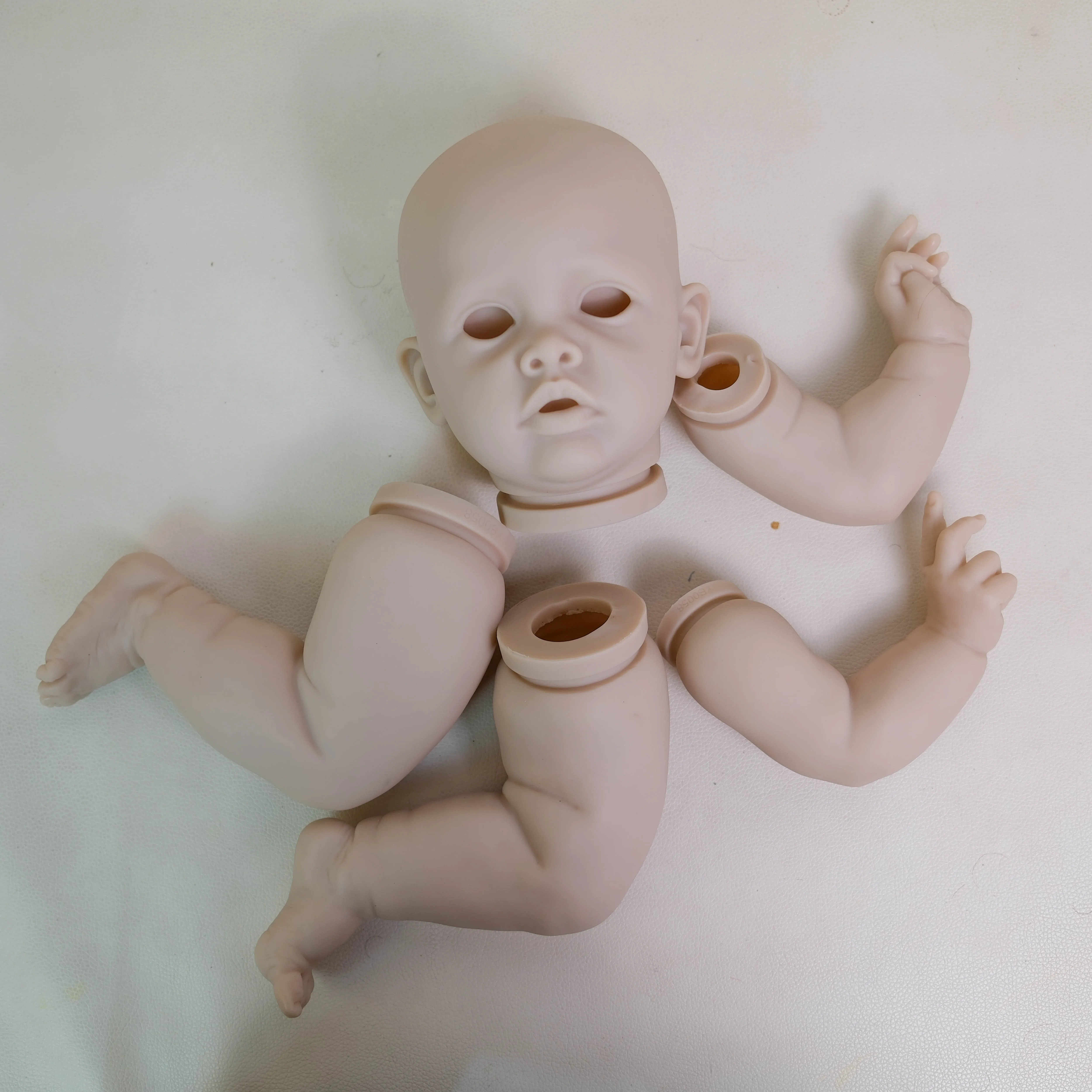 Nowy, limitowany zestaw do samodzielnego wykonania lalki Reborn Benjamin, 22 cale, niedokończony, wysokiej jakości, puste części lalki DIY z materiałowym ciałem i oczami.