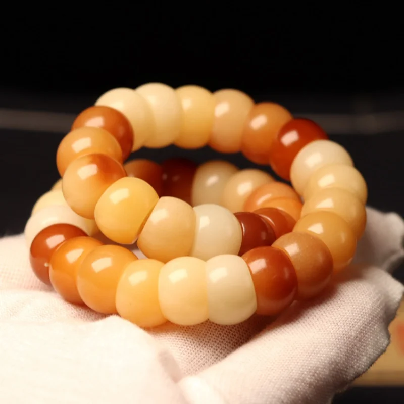 

Weathering Duobao Bodhi Root Pork Intestine Single Circle Bracelet 36Bodhi Root Pork Intestine Fan Surface Bodhi Root Handheld