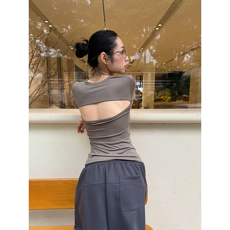 Benuynffy Solid Color Cut Out Back Crop Top Women 2026 Summer New O-Neck Short Sleeved Slim Fit Casual Female T-Shirts Tops