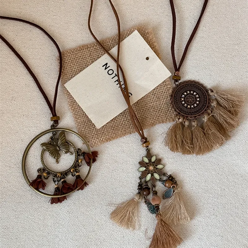 

Bohemian coffee color retro tassel necklace for women, exotic ethnic style butterfly pendant, sweater chain, vintage accessory