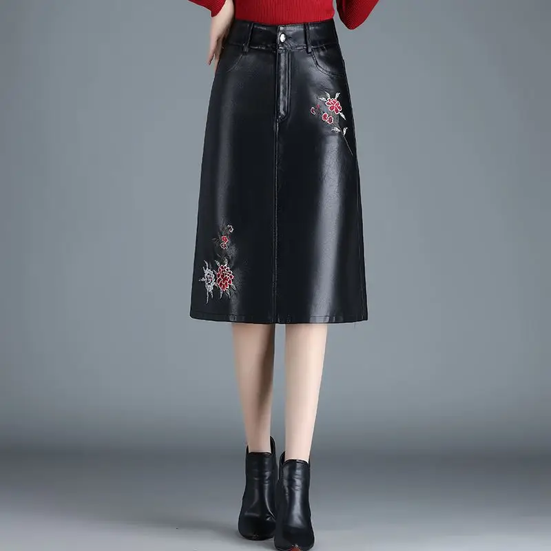 

Autumn Floral Embroidered A-line PU Leather Midi Skirt High Waisted Zipper Slim Hip Knee Length Faux Leather Black Skirts