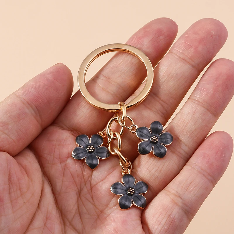 Aihua 40 Farben Niedlicher Pflanzen-Schlüsselanhänger Emaille Sakura-Blumen-Schlüsselanhänger für Frauen Mädchen Handtasche Anhänger Autoschlüsselhalter DIY Schmuck Geschenke – Detail 7