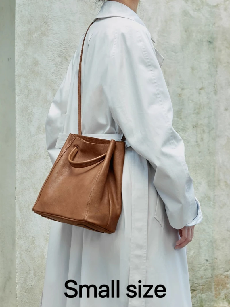 Minimalistischer Stil aus echtem Leder, große Kapazität, Damen-Nischen-Retro-Rindsledertasche, vielseitige Eimer-Schulter-Crossbody-Tasche