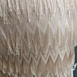 Spring and summer wave tassel cut flower chiffon fabric jacquard European and American style women's dress clothing with fringe