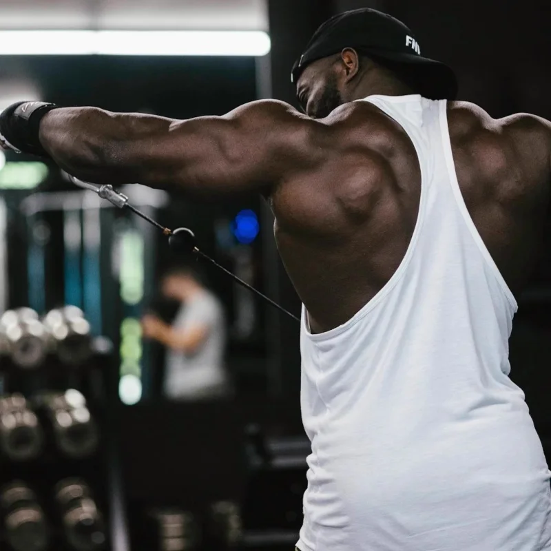 Canotta da uomo con cinturino sottile con retro scollato, tessuto traspirante, ideale per bodybuilding e allenamenti in palestra intensi quotidiani