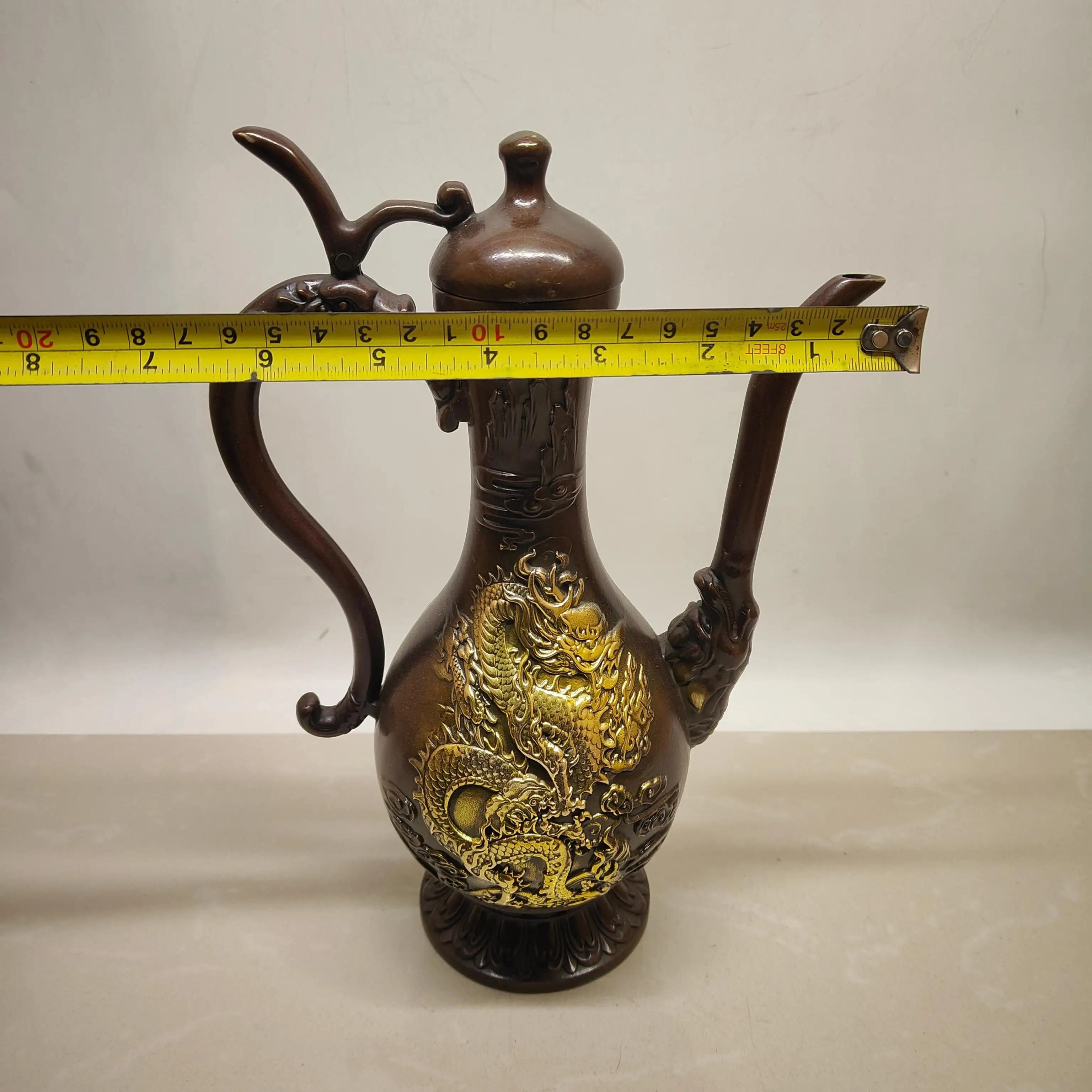 A large dragon and phoenix wine pot made of brass imitation purple copper gilded with antique craftsmanship.,Free shipping