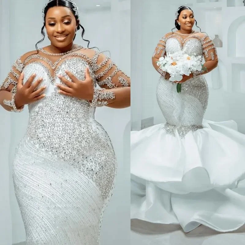 Suknie ślubne na zamówienie, białe, afrykańskie, dla panny młodej, krój syreny, odpinany przezroczysty dekolt, zdobione koralikami, koronkowe, warstwowy tiul.