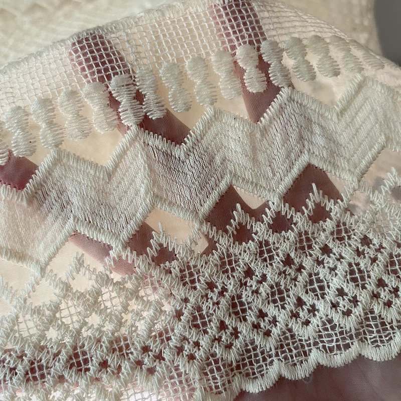 

Elegant lace embroidery geometric wave striped mesh fabric is used in wedding dresses sewing craft accessories
