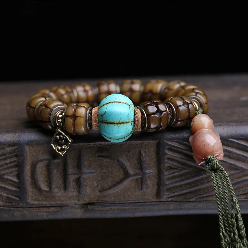 Single-Loop Bracelet With Inlaid Turquoise, Bone, And-Shaped Side-Hanging Copper Accessory
