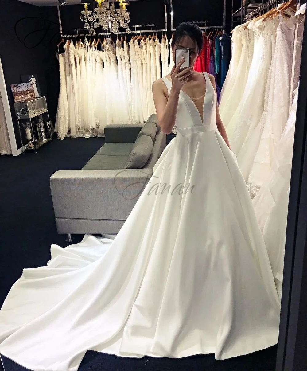 Vestidos de novia elegantes sin mangas personalizados, vestido de novia Sexy con espalda descubierta y cuello en V, vestidos de novia calados de Color sólido