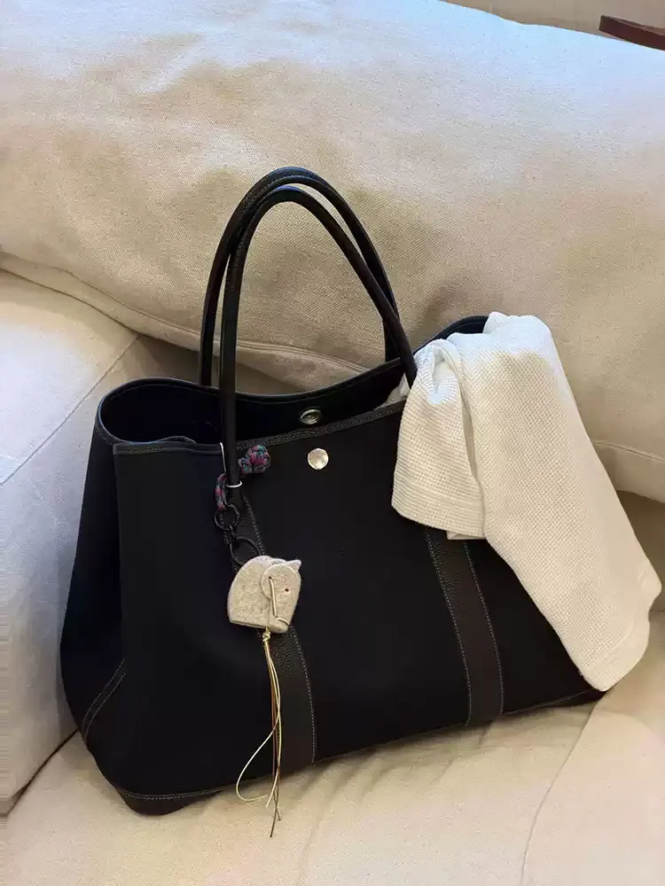 Black Canvas Large Capacity Tote Bag Women's 2026 New Commuter Shoulder Handbag Soft PU Leather Pure Color Trending Tote