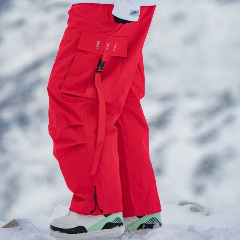 

2025 New Winter Skiing Pants Windproof Waterproof Women Men Breathable Ski Strides Solid Baggy Loose Outdoor Sports Trousers