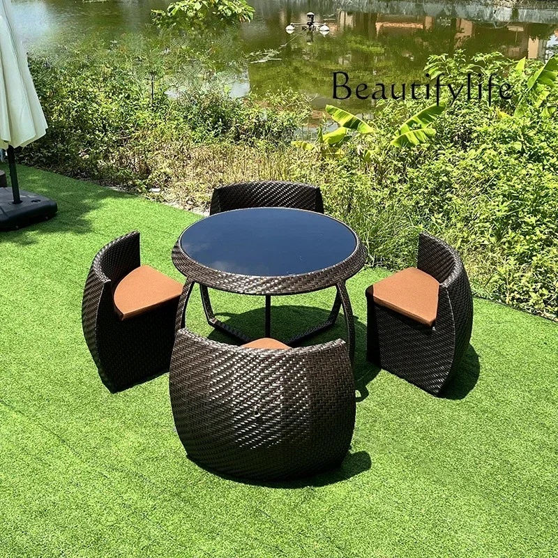

1 outdoor garden courtyard waterproof rattan chair Outdoor villa rattan table and chair combination