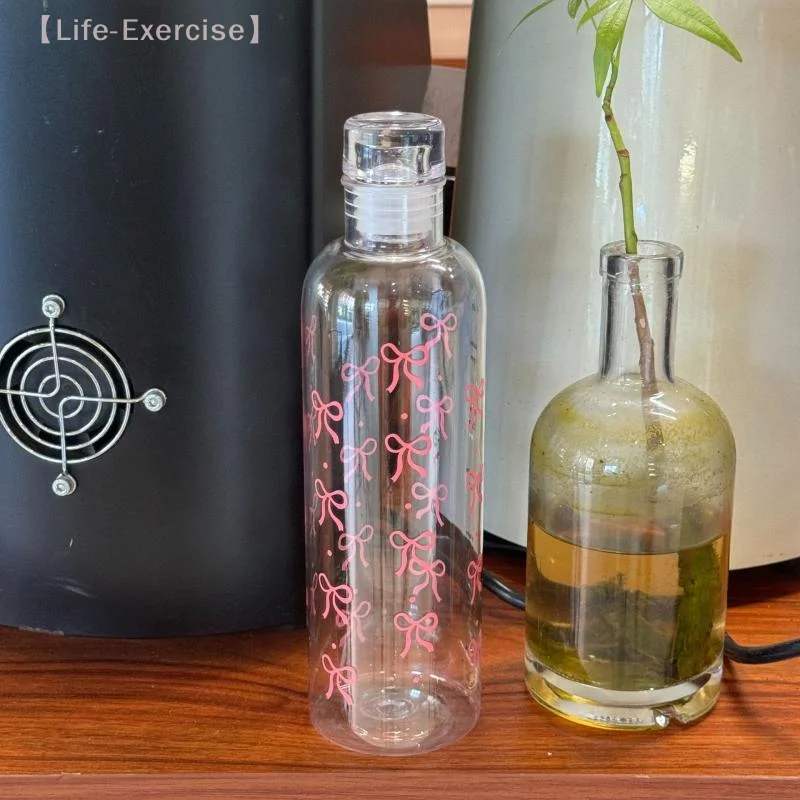 Bottiglia d'acqua in plastica con fiocco Kawaii con tazza d'acqua trasparente in scala temporale per sport all'aria aperta che bevono bottiglia d'acqua per succo di latte da 500 ml