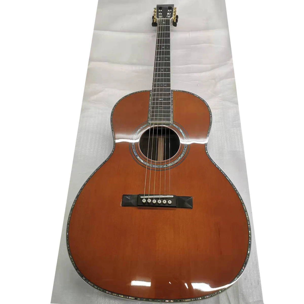 

Promotion of a solid wood oo42 series black finger abalone shell inlaid acoustic guitar