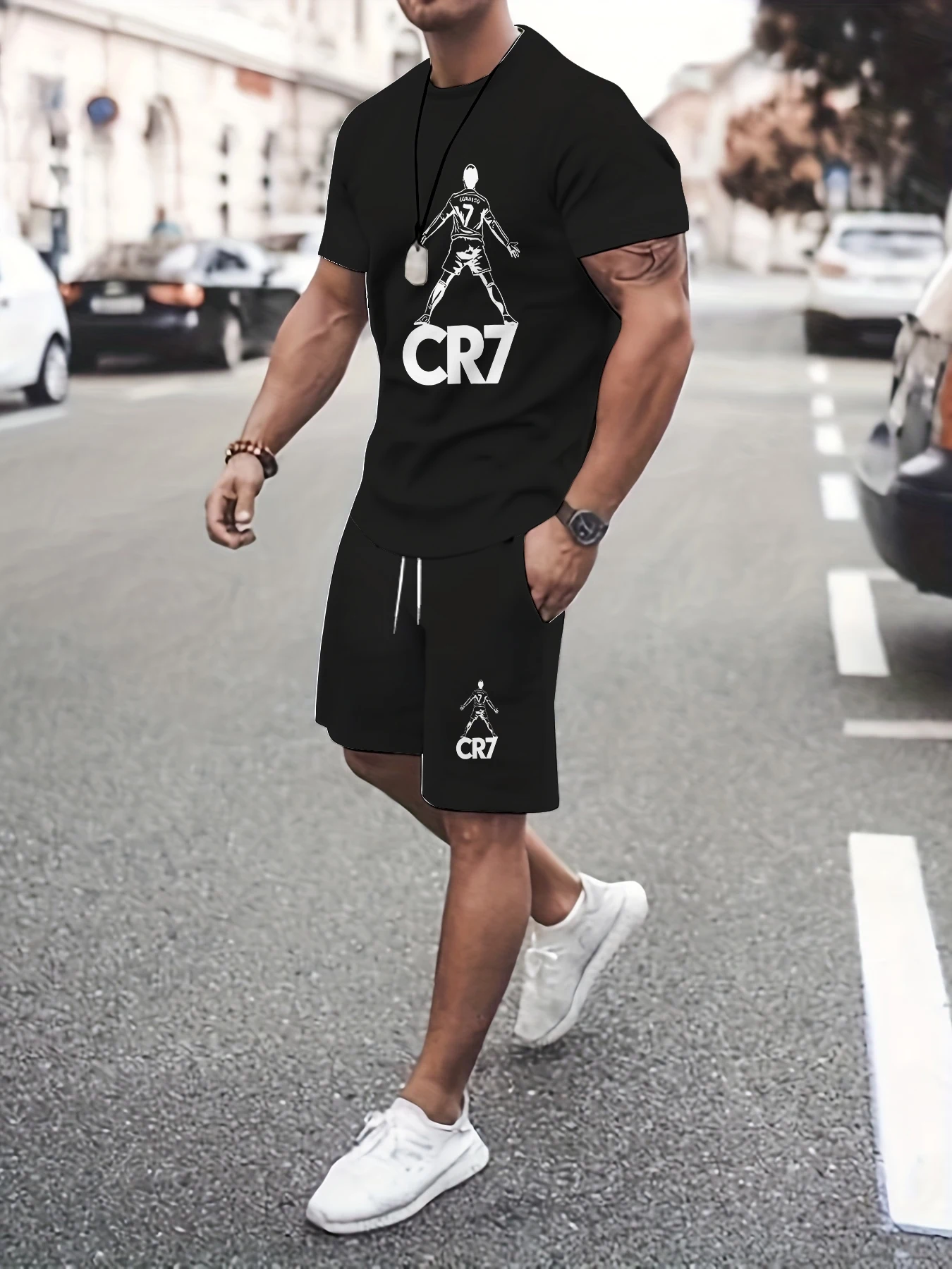 

Повседневная универсальная одежда для мальчиков. Черная футболка с принтом и шорты. Удобный комплект из двух предметов для выхода на выход.