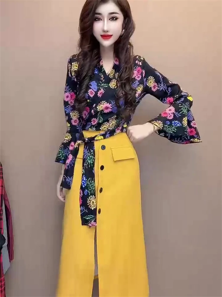 Conjunto de estilo avançado de camiseta feminina com decote em v, alça elegante, cintura alta, emagrecimento, meia saia, duas peças, conjunto moderno