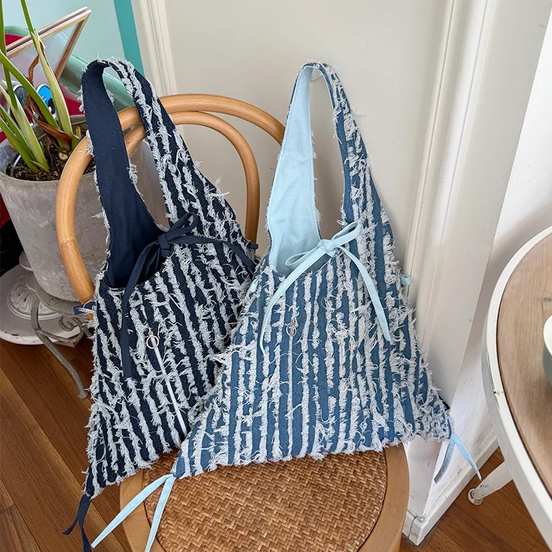 

Полосатая джинсовая сумка-тоут с кисточками, универсальная весенне-летняя новая сумка на одно плечо со шнуровкой и бантом, темпераментная дорожная сумка подмышками