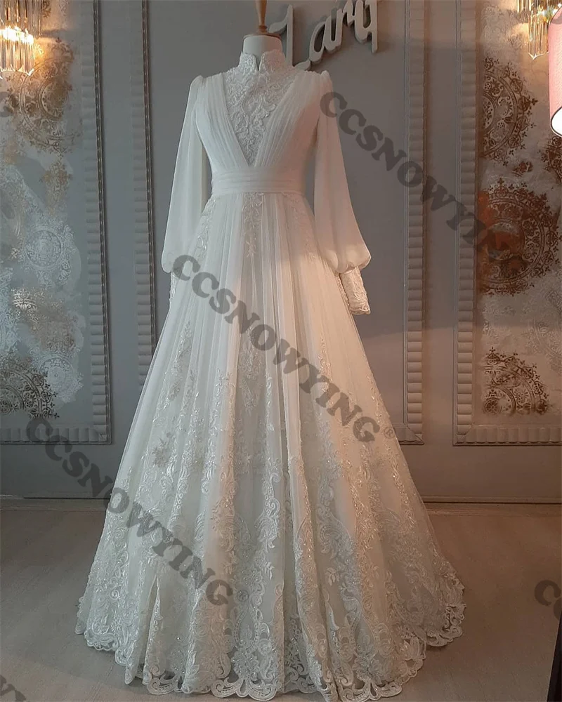 Elegante tule apliques de manga longa vestidos de casamento a linha alta pescoço vestido de noiva das mulheres pérolas árabe dubai vestidos de novia