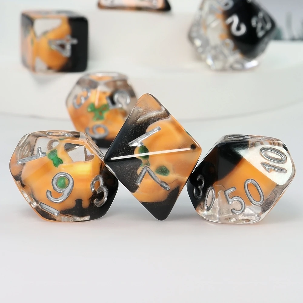 A Set of Pumpkin-Colored Skull Core-Spun Resin Dice, Halloween Multi-Element Ensemble Dice, Various Game Accessories and Supplies