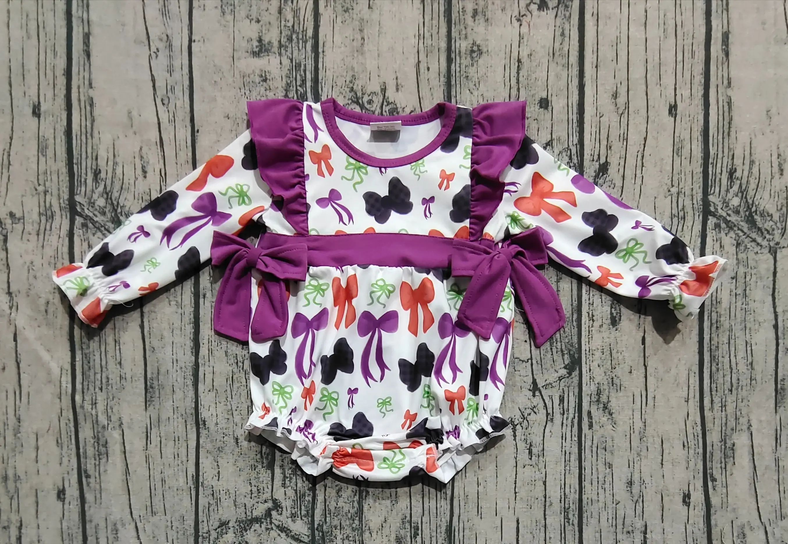 

Wholesale Children Newborn Halloween Bows Ruffle Romper Baby Girl Infant Long Sleeves Fall Bubble Kids Toddler Purple Jumpsuit