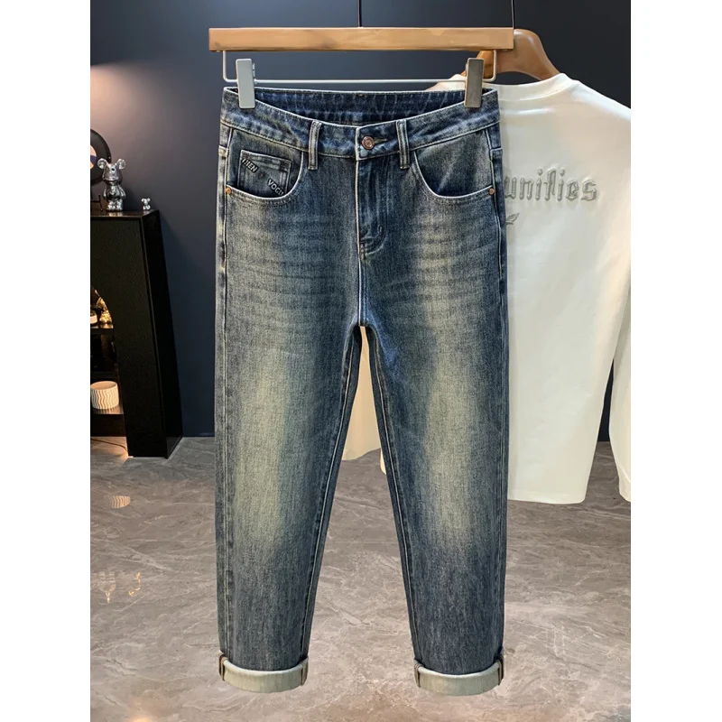 جينز جديد لخريف 2025 عالي الجودة فضفاض ومستقيم الساق للرجال موضة شارع العليا متعدد الاستخدامات النسخة الكورية سراويل تقليدية