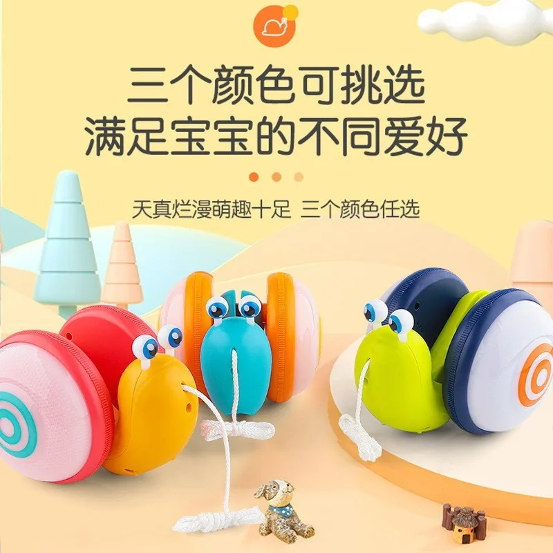 

2024 Fun Children's Rope Glowing Music Snail Cute Fun Electric Rope Pulling and Walking New Creative Toy Stall Toys Puzzle 1-3Y