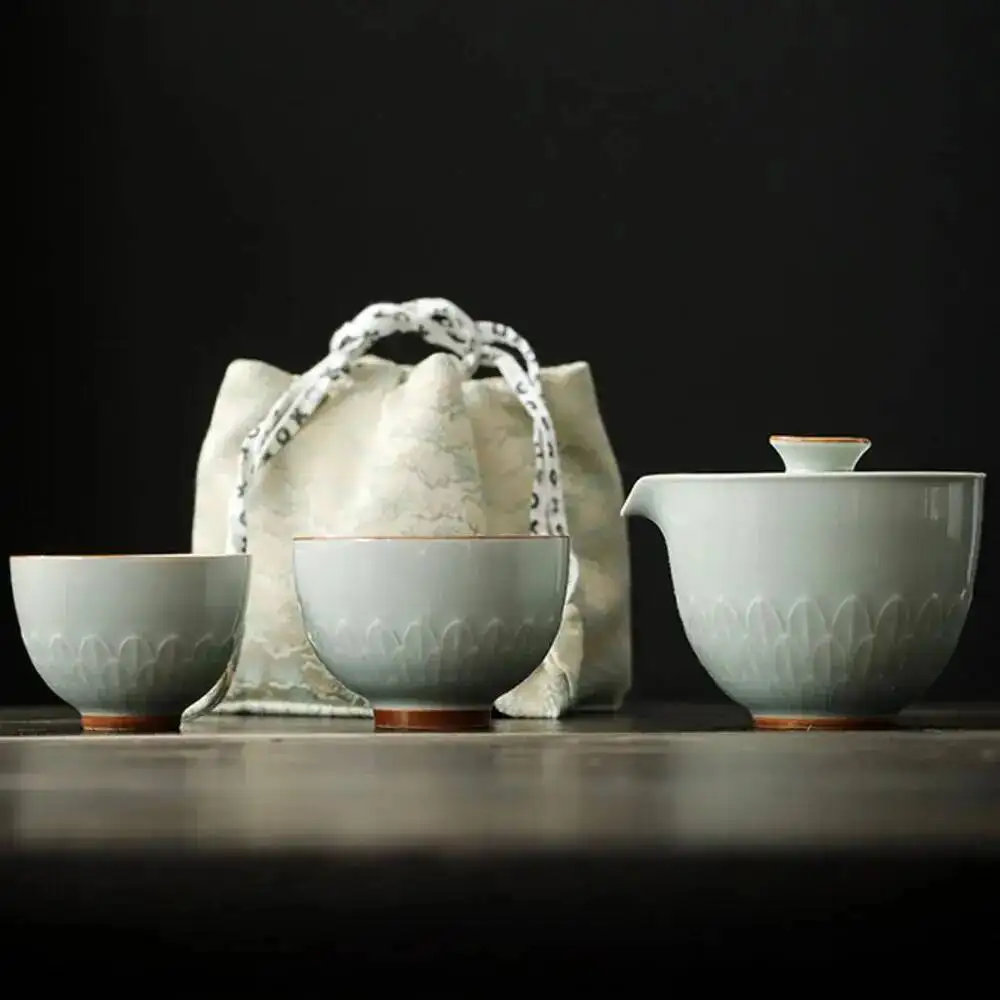 

Chinese White Blue Lotus Porcelain Tea Cup Tea Pot With Bag Antique Tea Maker Camping Outdoor Portable Teawarer