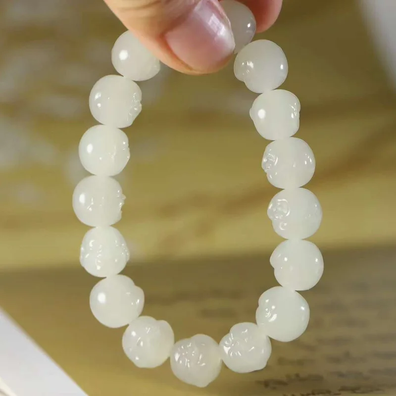 

Natural Xinjiang Hetian Jade Qinghai Material Ice Clear Water Buddha Head Carved Men and Women Bracelet