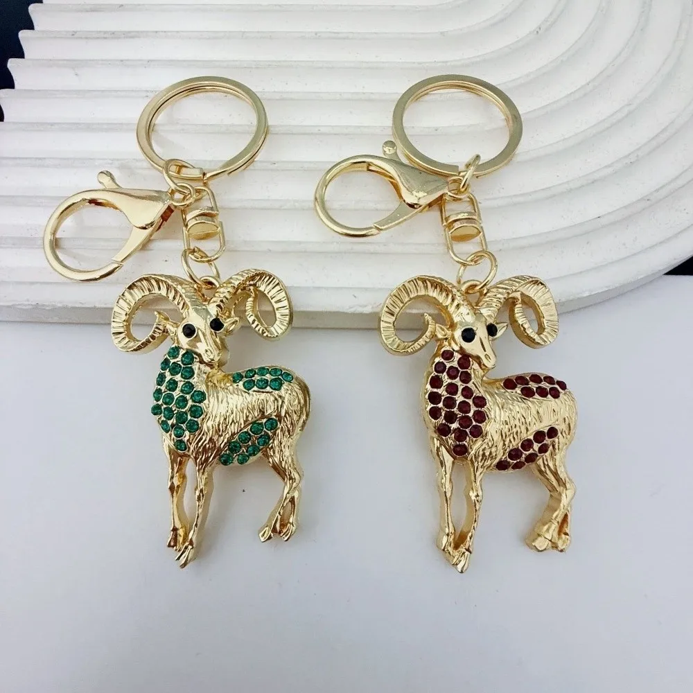 Festive Rhinestone Goat Keychain Sparkling Gold 2027 Sheep Year Bag Pendant Metal Cartoon Sheep Pendant Chinese New Year