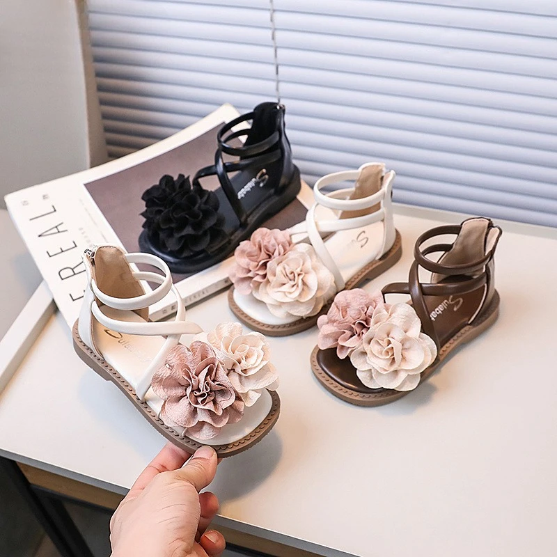 

Новые детские летние сандалии 2026 года, хит продаж, римские сандалии для девочек, милые сандалии с цветами, модные повседневные сандалии-принцессы для детей, открытые сандалии без каблука