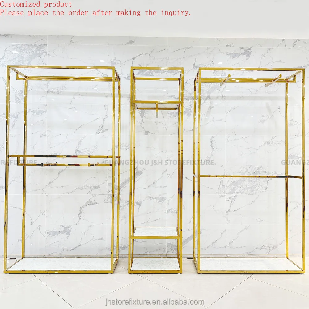 

На заказ. На заказ. Точечные новые товары Напольная подставка для одежды Металлическая полка Витрина Выставочный зал Дизайн Золотой для бутикового магазина