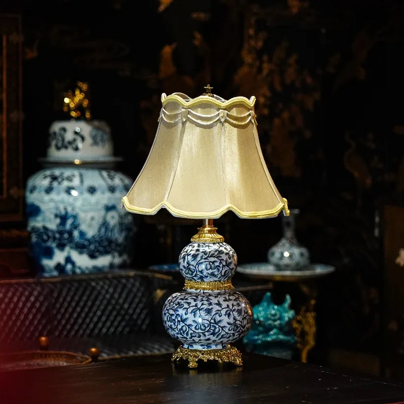 

Porcelain inlaid copper blue and white porcelain, gourd table lamp light luxury, decorative bedroom, creative bedside ornament